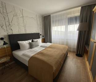 Schlafzimmer im Apartment Premium Plus Schlafzimmer im Apartment Premium Plus